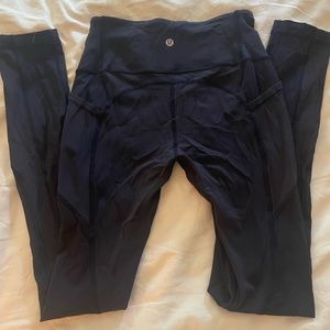 Size 4 LuluLemon Navy blue leggings!